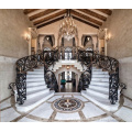 Entrance hall curved staircase stairs design indoor